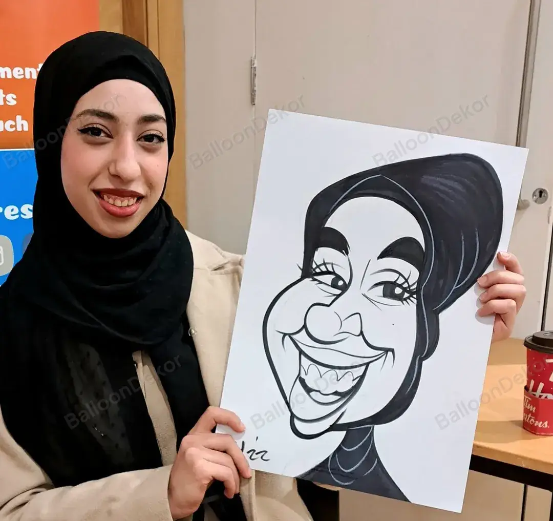 Guest holding her caricature sketch drawn by a caricature artist at a party in Dubai