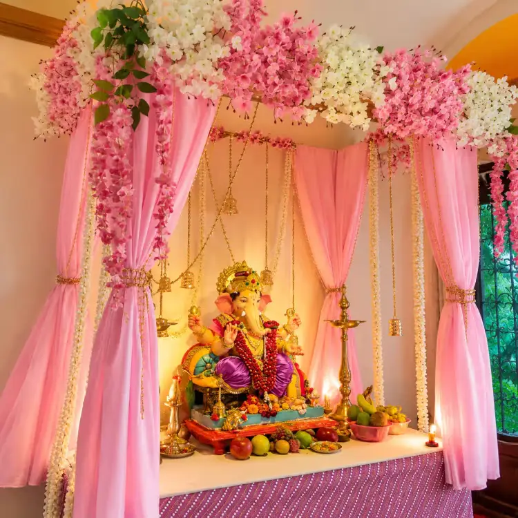 Ganpati Decoration with Floral Backdrop
